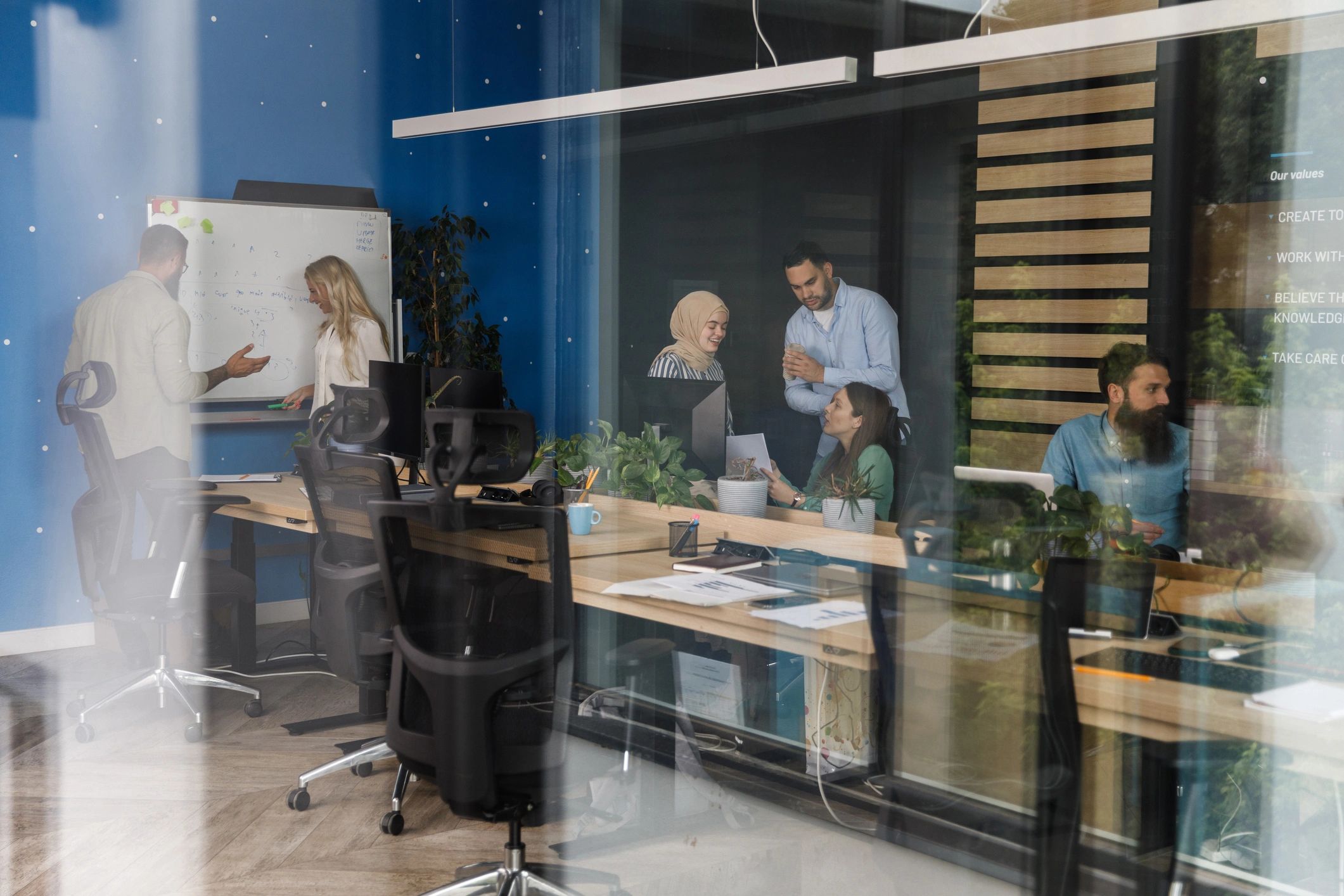 Business professionals collaborating on strategy in a modern office