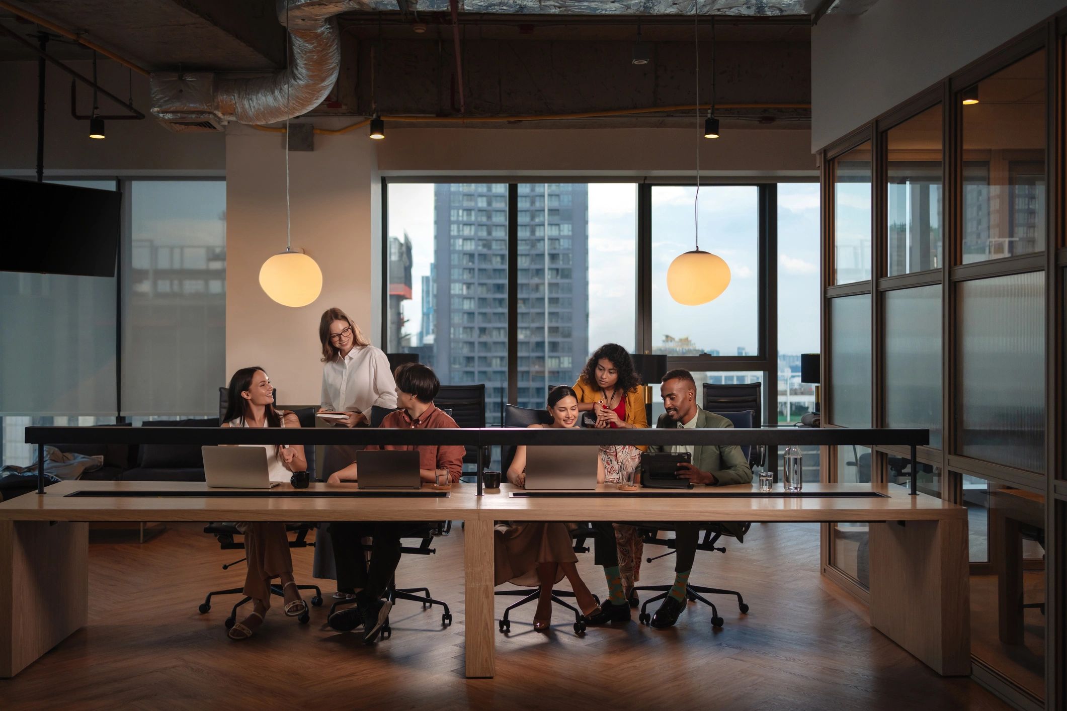 Technology consulting team collaborating in a modern office