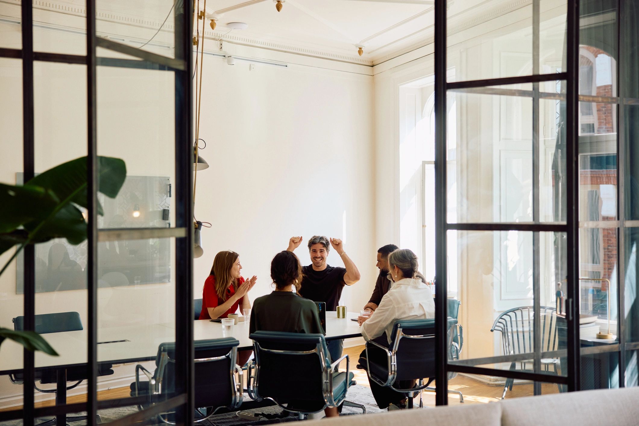 Small business professionals brainstorming in a modern office